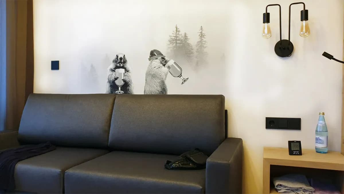 Custom wall mural of wildlife toasting in misty forest for hotel lounge by InnoPrint KSA